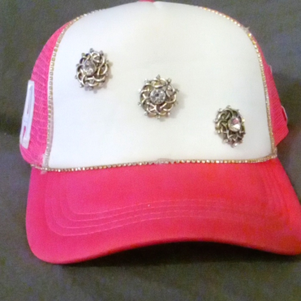 Hand crafted customizable/pre-made hats. Most all pins, chains, jewelry etc are